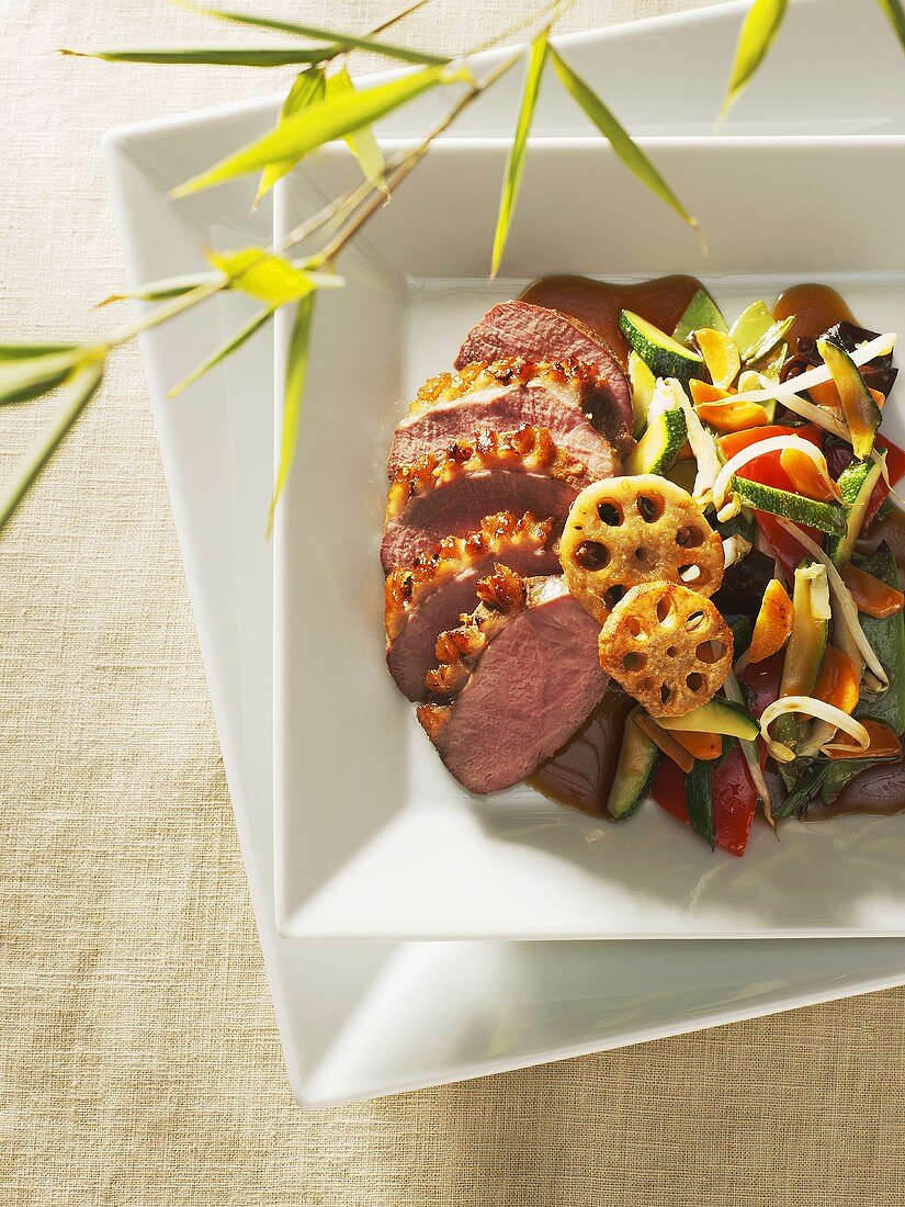Duck with thousand spice glaze and Asian vegetables