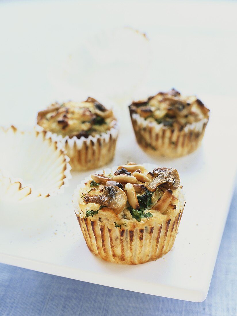Savoury muffins with mushrooms and pine nuts