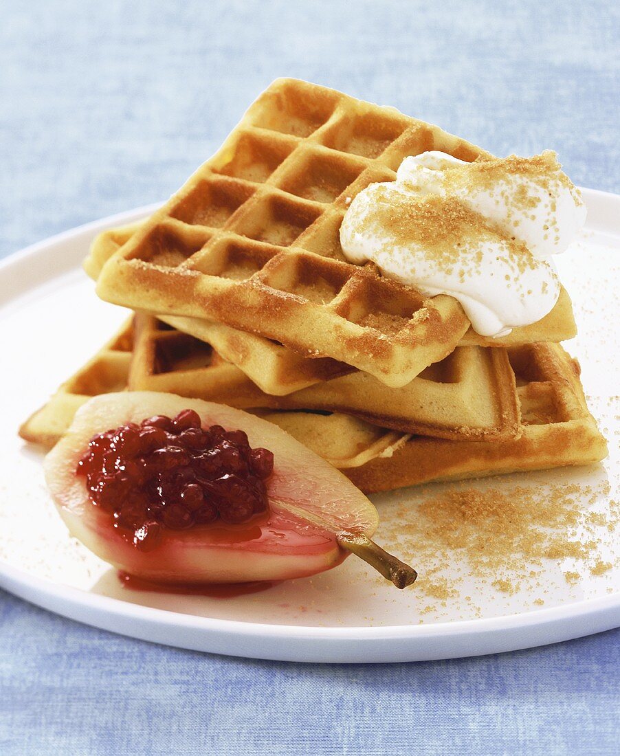 Waffles with cranberry-stuffed pear and cream