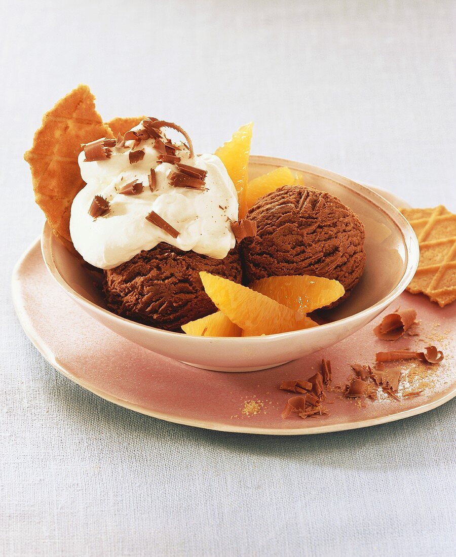 Chocolate ice cream sundae with tipsy oranges