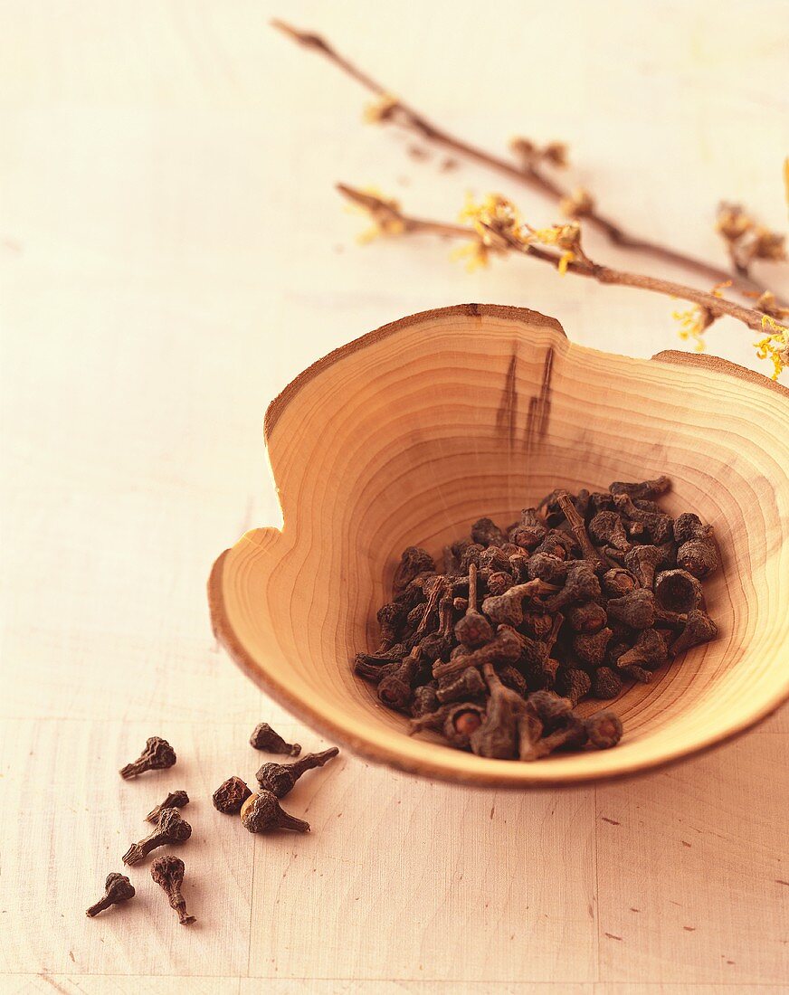Cloves in a wooden bowl