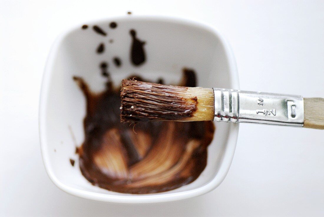 Paintbrush with chocolate icing