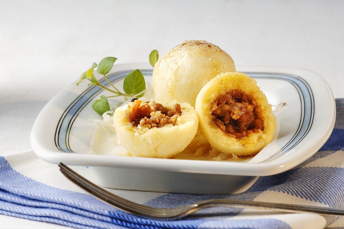 Crackling dumplings with Riesling sauerkraut