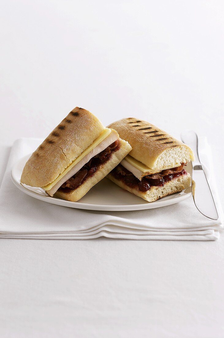 Panini with cranberries, ham and cheese