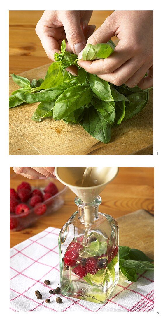 Pouring vinegar into bottle for raspberry and basil vinegar
