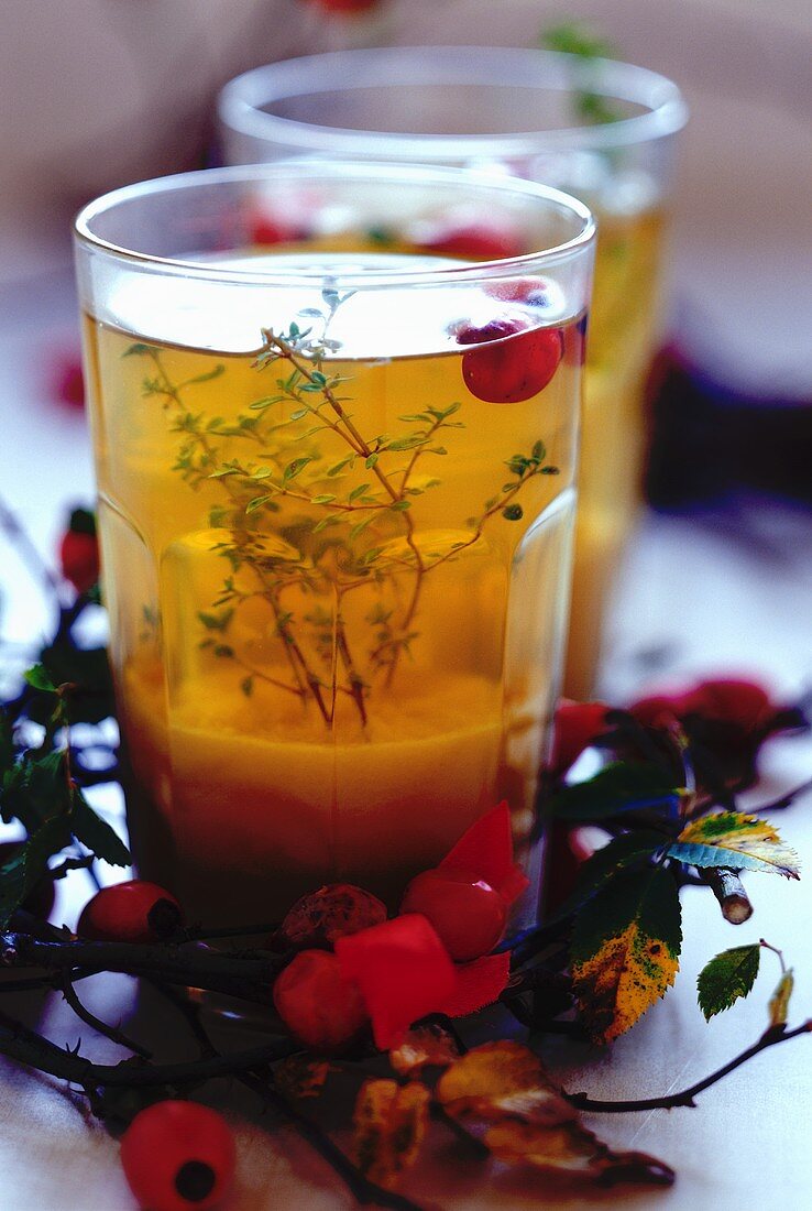 Ginger tea with thyme and red berries