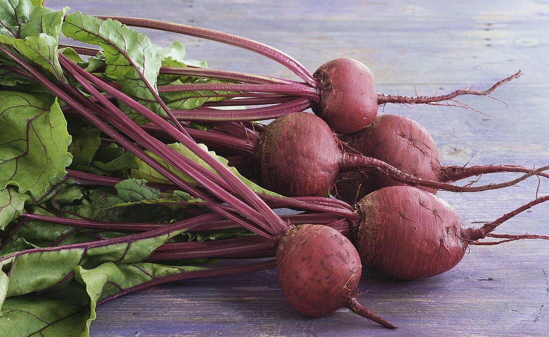 Several beetroots with leaves