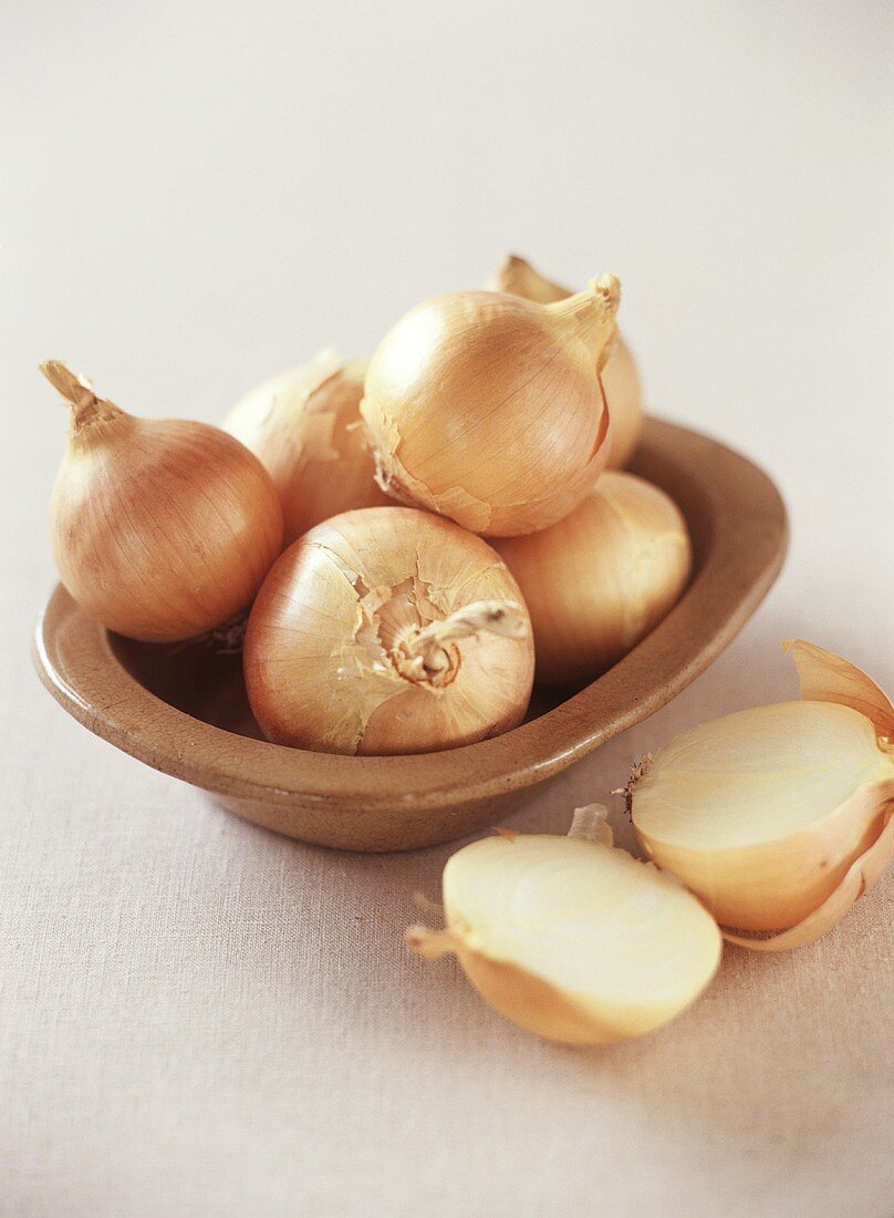 Several onions in a bowl