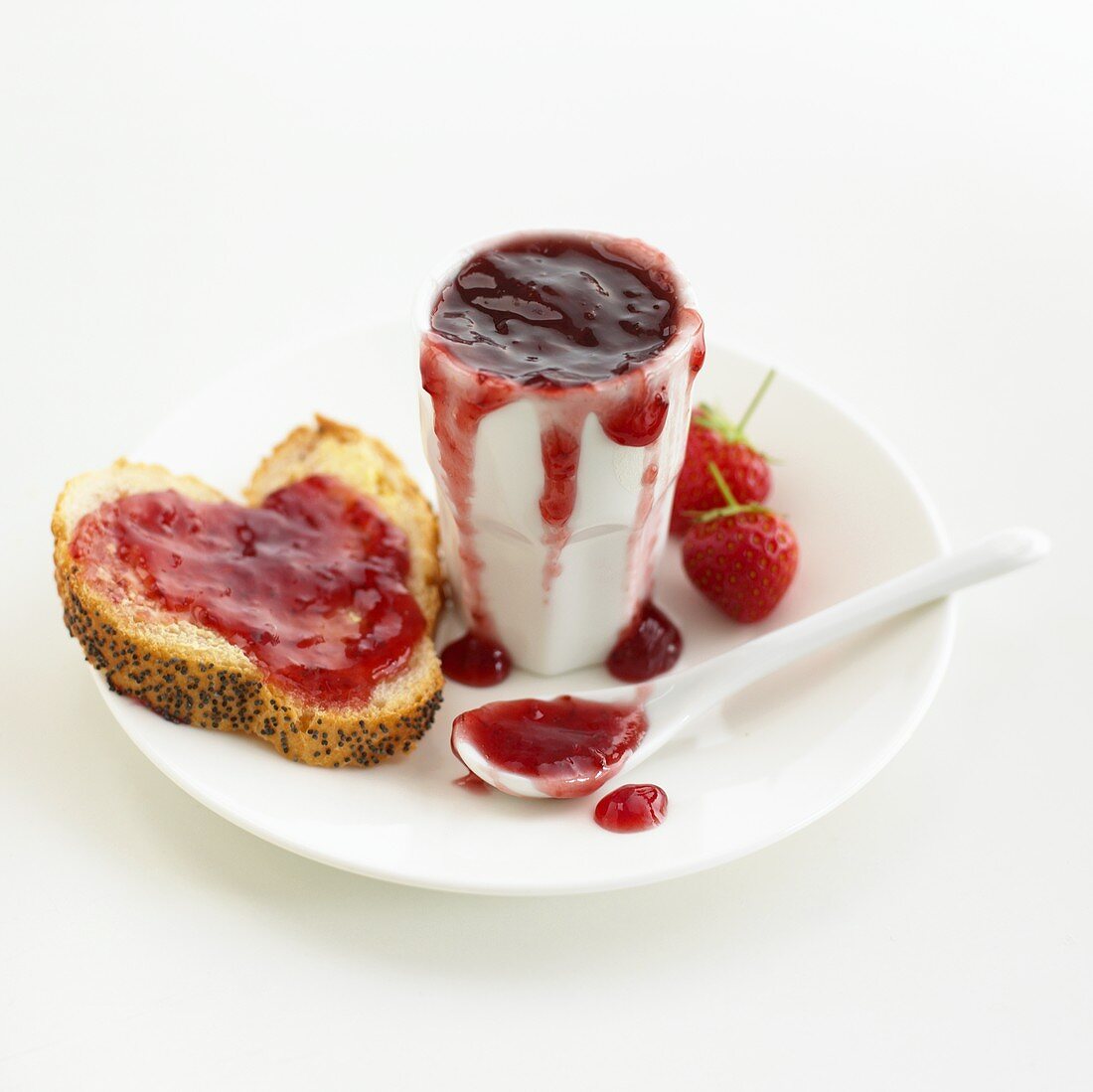 Strawberry jam and slice of bread