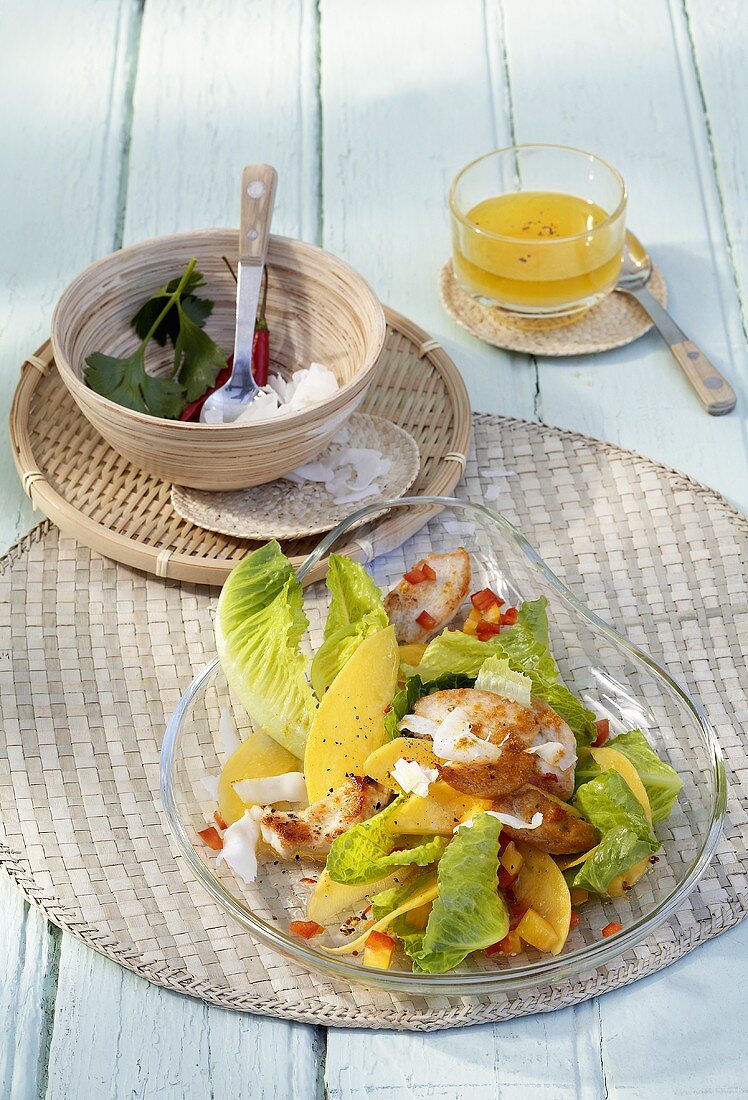 Mango and chicken salad with coconut