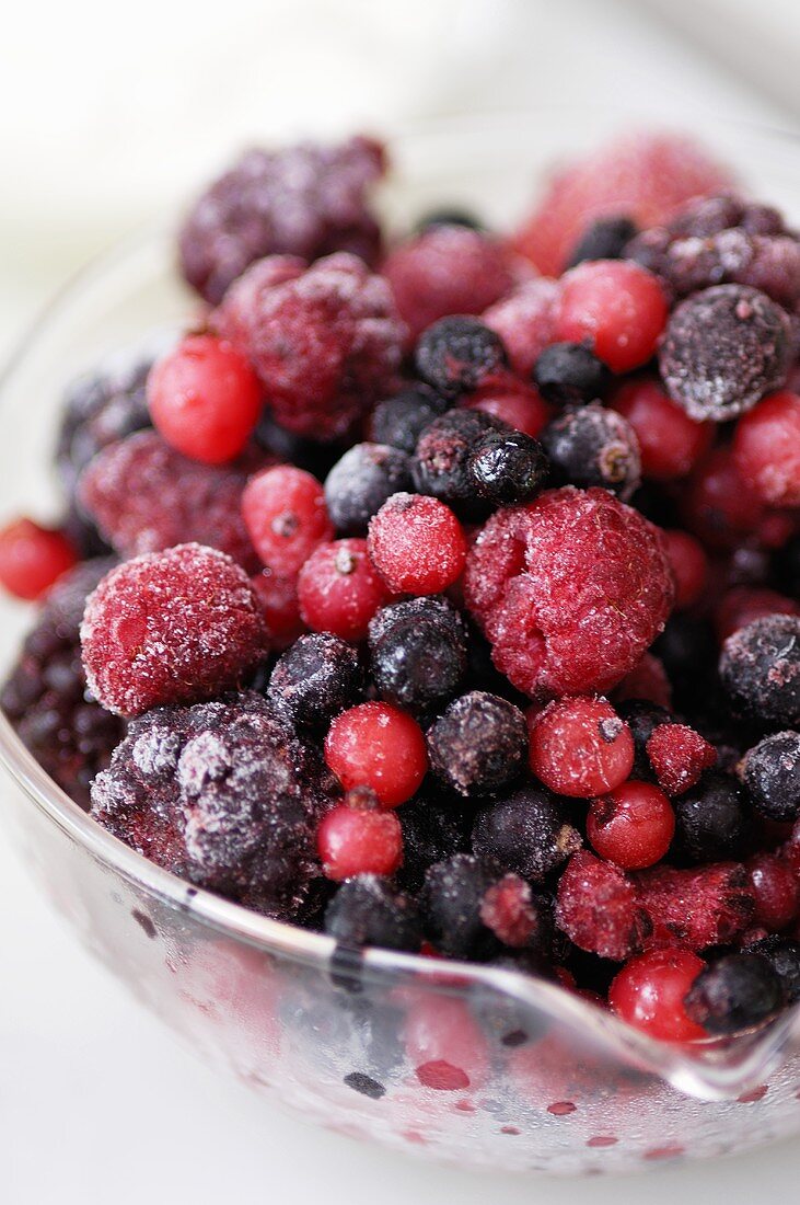 Frozen berries in a glass dish