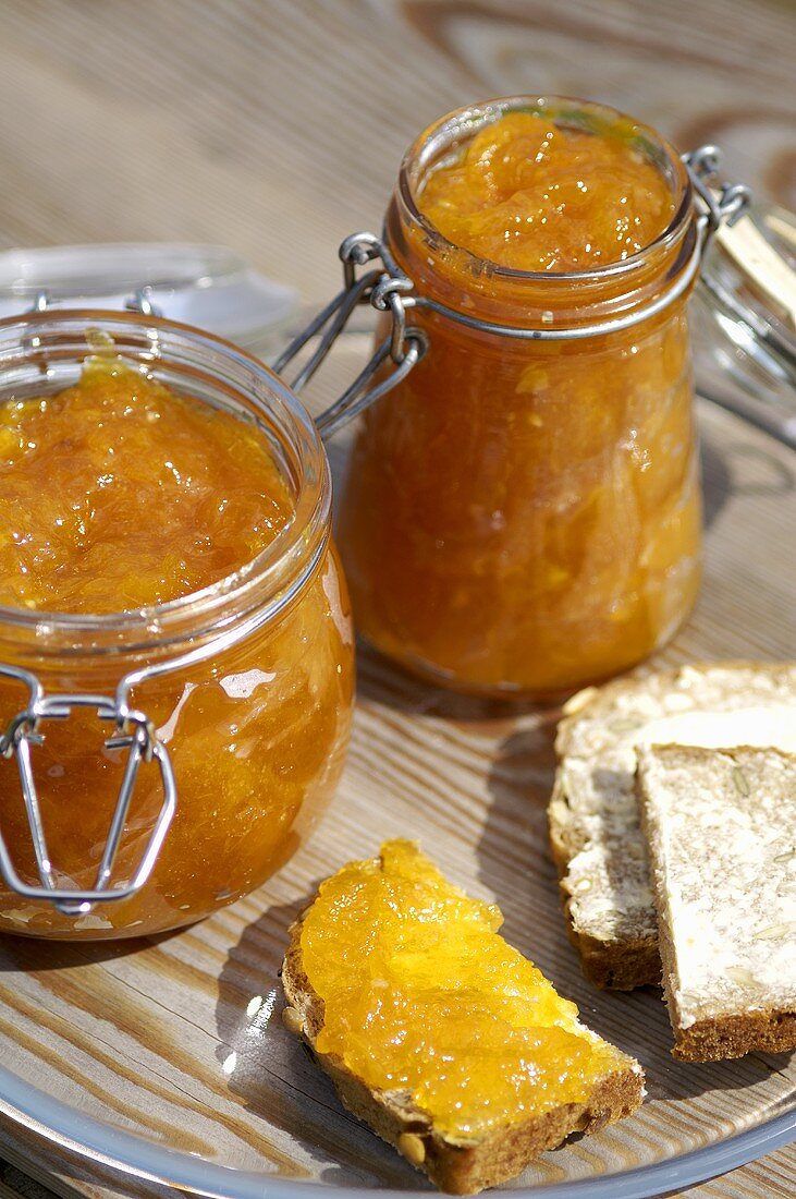 Apricot jam and piece of bread and jam