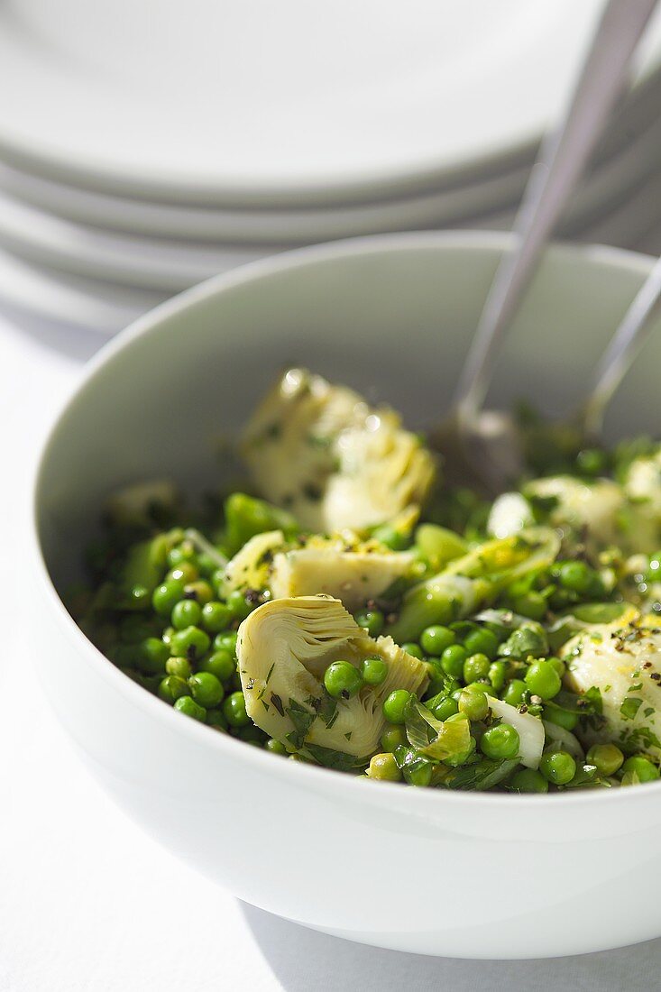 Peas with spring onions and artichokes