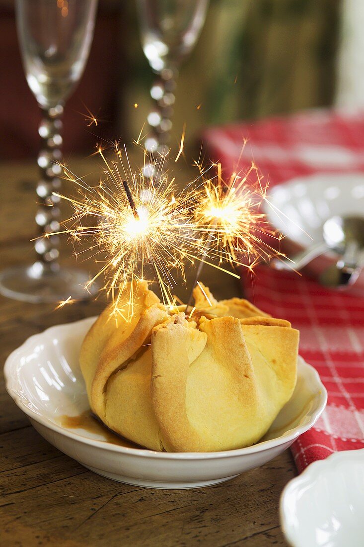 Apfel im Schlafrock mit Wunderkerzen