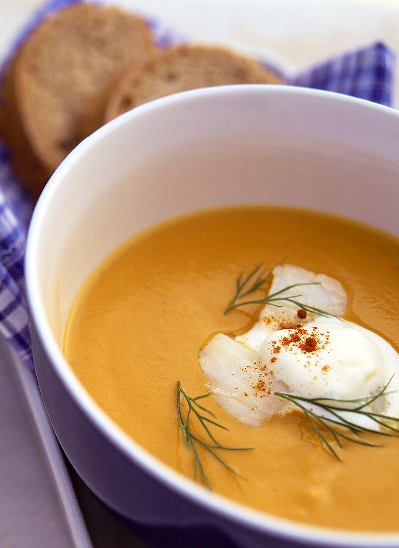 Pumpkin soup with cod and dill