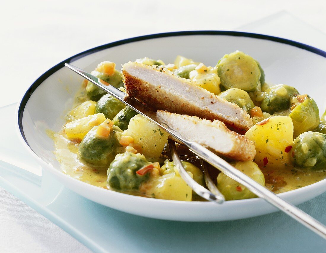 Brussels sprout curry with chicken escalope