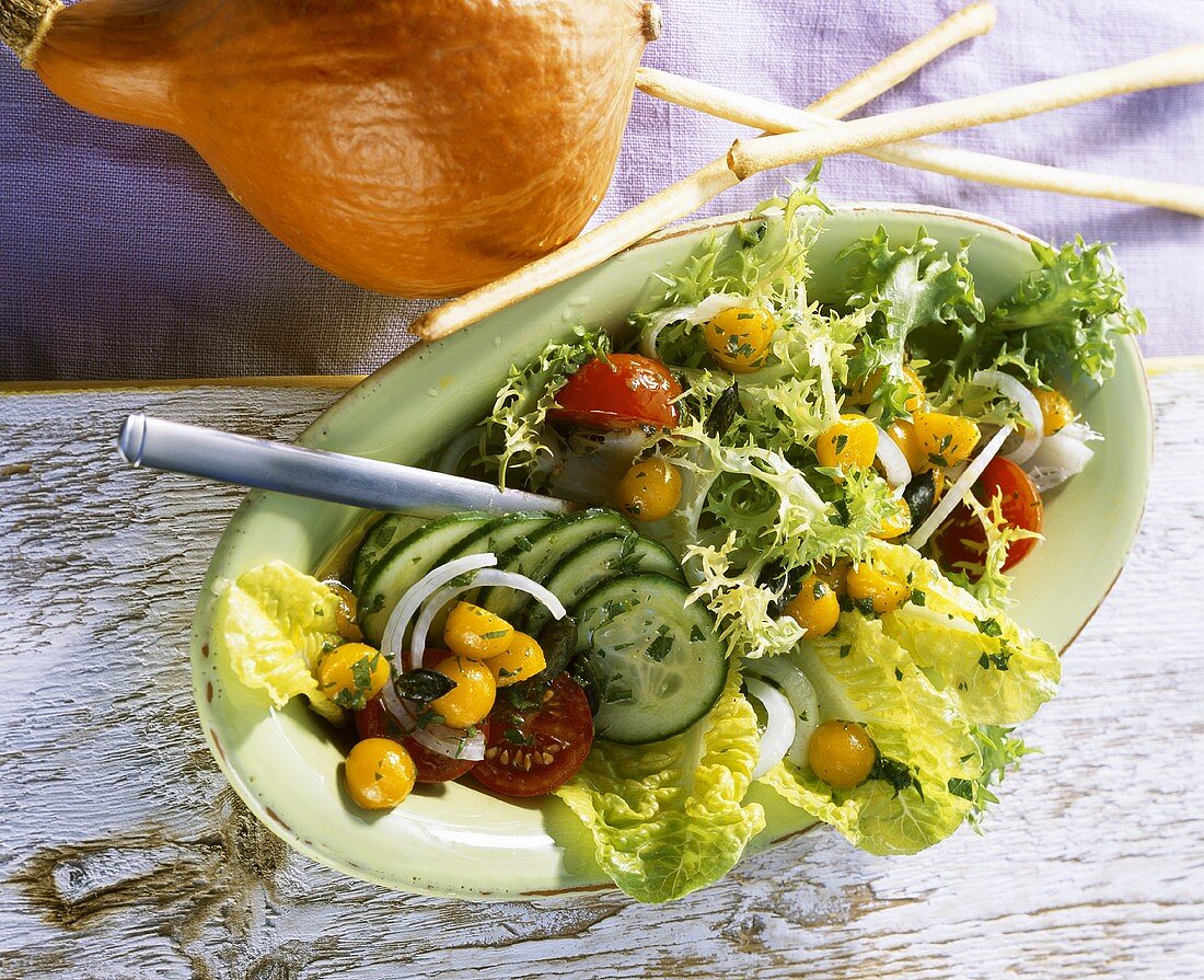 Salad leaves with pumpkin balls