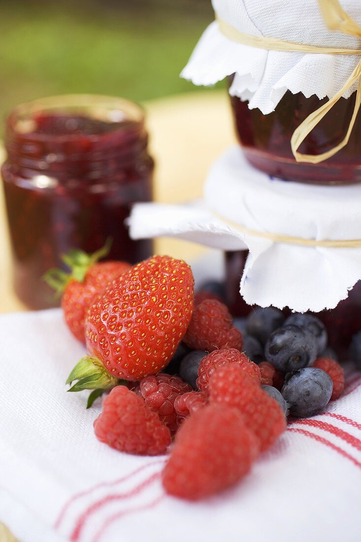 Berry jam as a gift and fresh berries