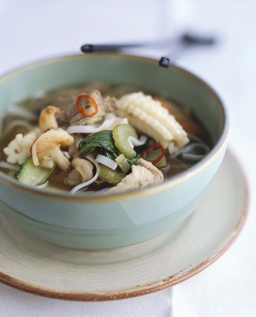 Noodle soup with meat, shrimps and squid (Vietnam)