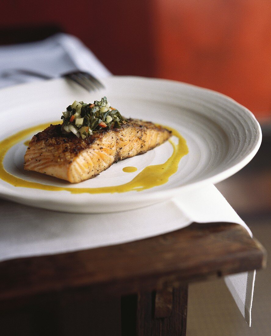 Grilled salmon steak with coconut curry and vegetables