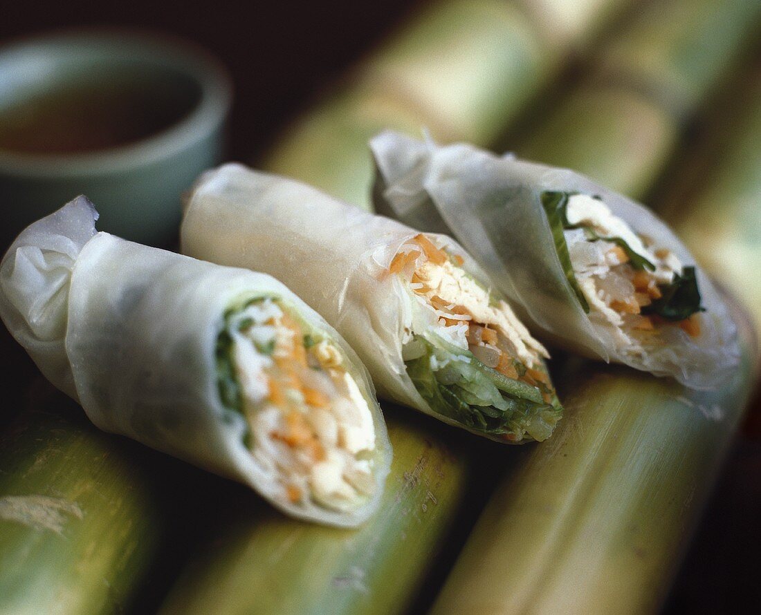 Unbaked spring rolls filled with shrimps, meat & mushrooms