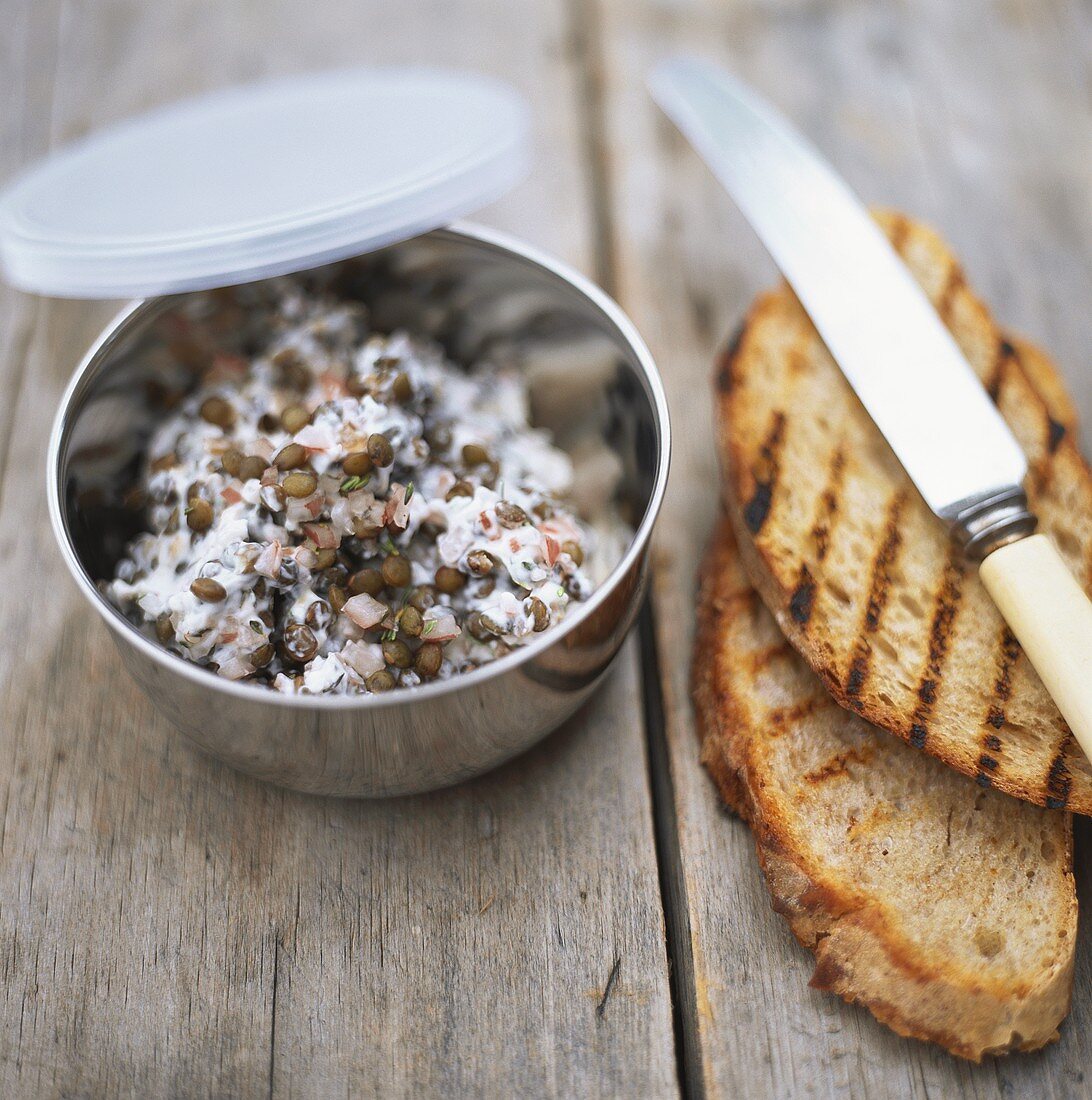 Lentil and radish spread with grilled bread