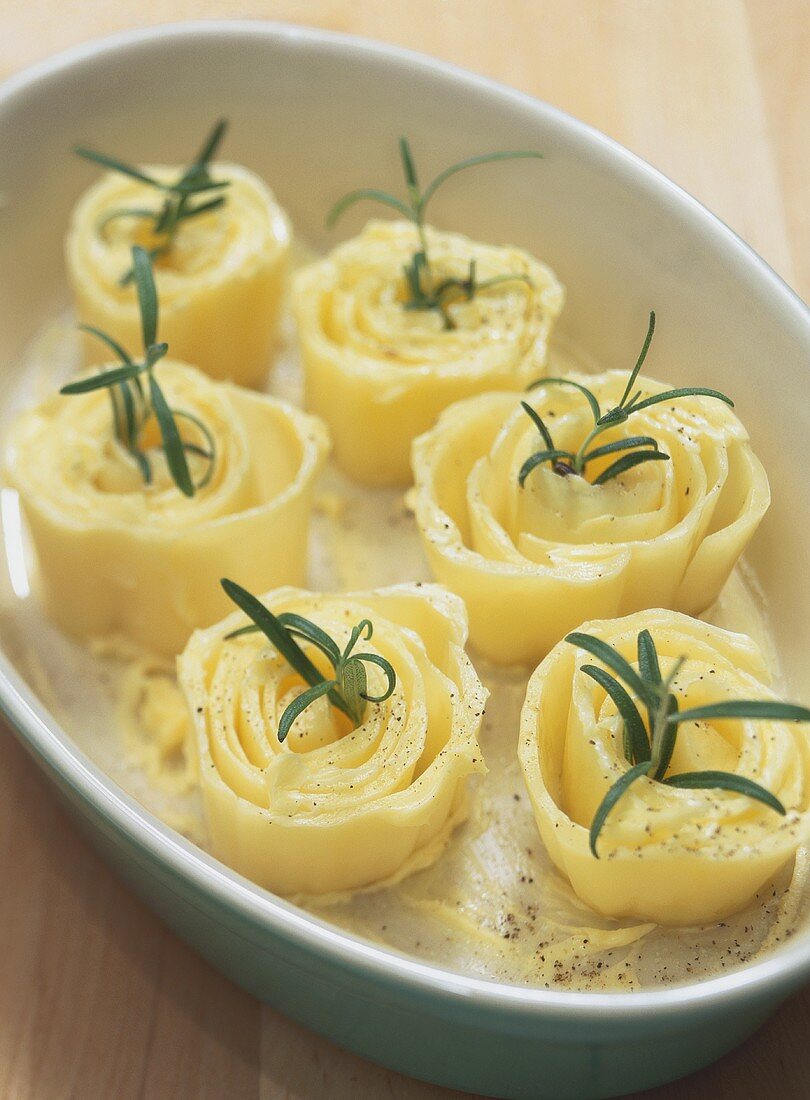 Rosemary potatoes in a baking dish, unbaked