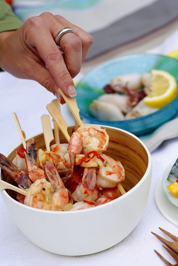 Skewered shrimps with chili and garlic butter