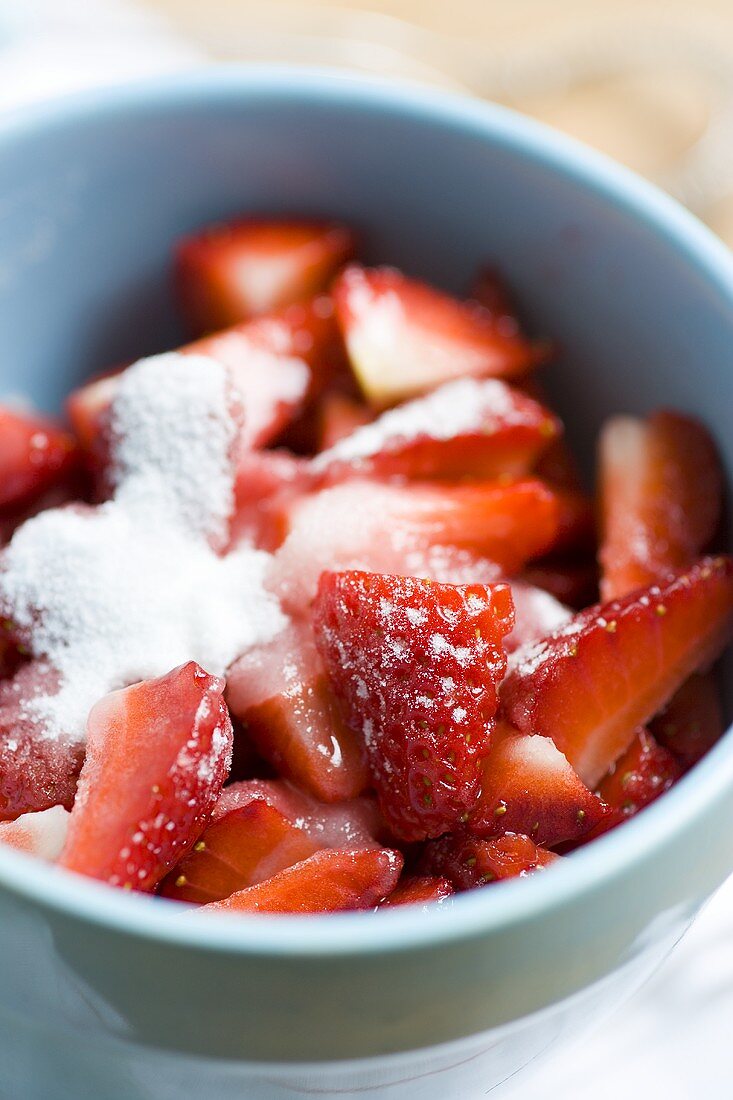 Fresh strawberries with icing sugar