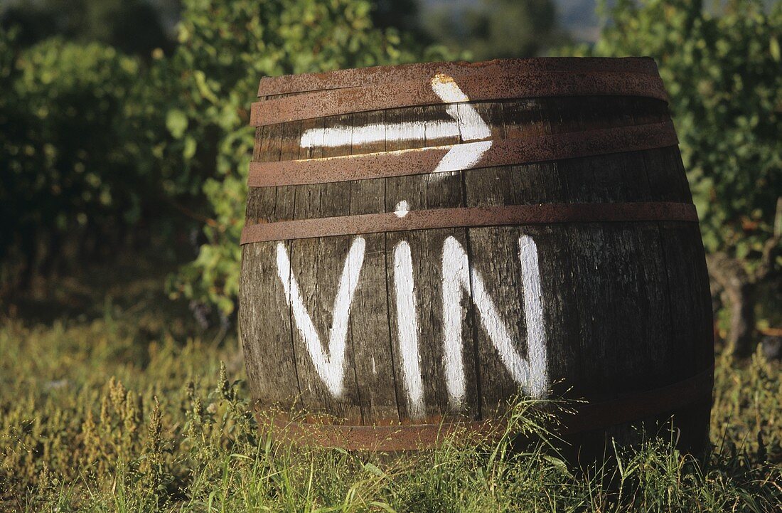 Wine barrel in open air, serving as signpost