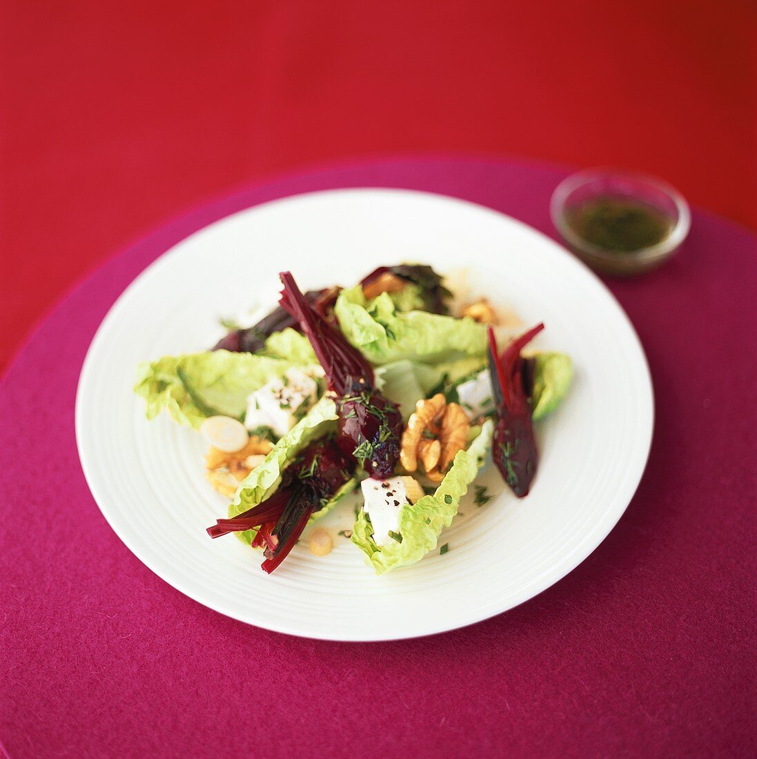 Lettuce with beetroot, sheep's cheese and walnuts