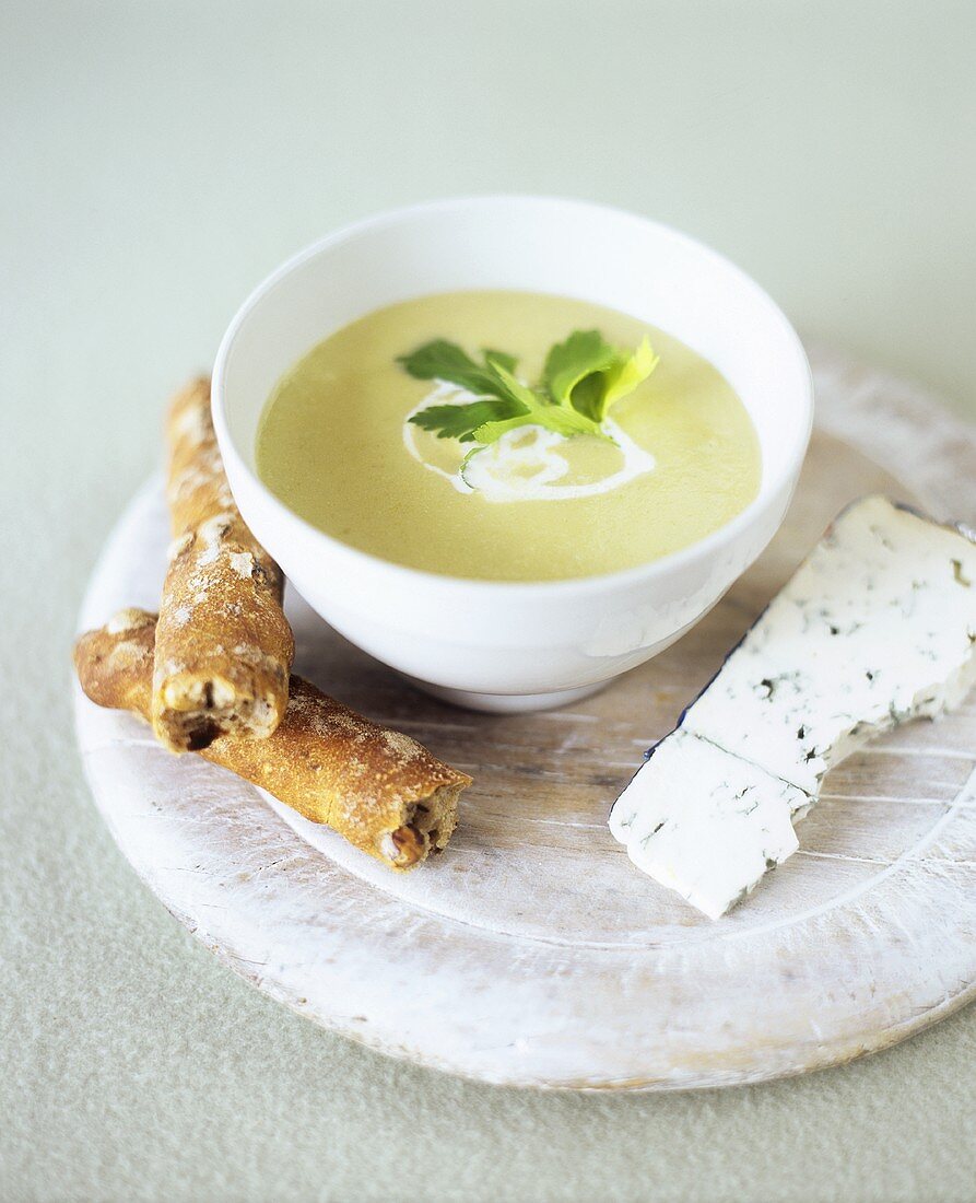 Celeriac cream soup with blue cheese and savoury stick