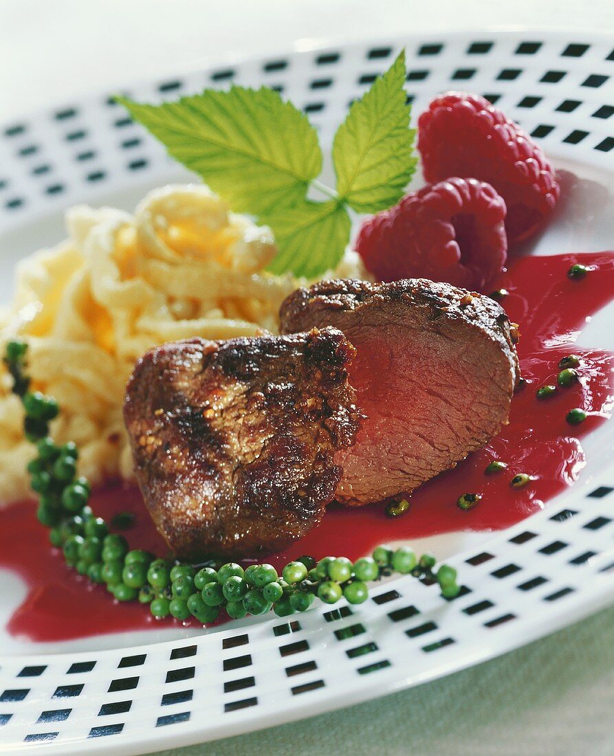 Raspberry sauce with green pepper with roast meat