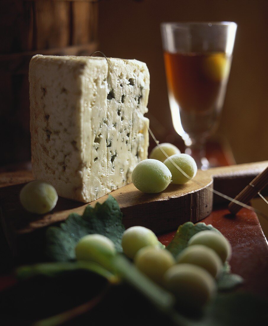 Roquefort with grapes and glass of wine