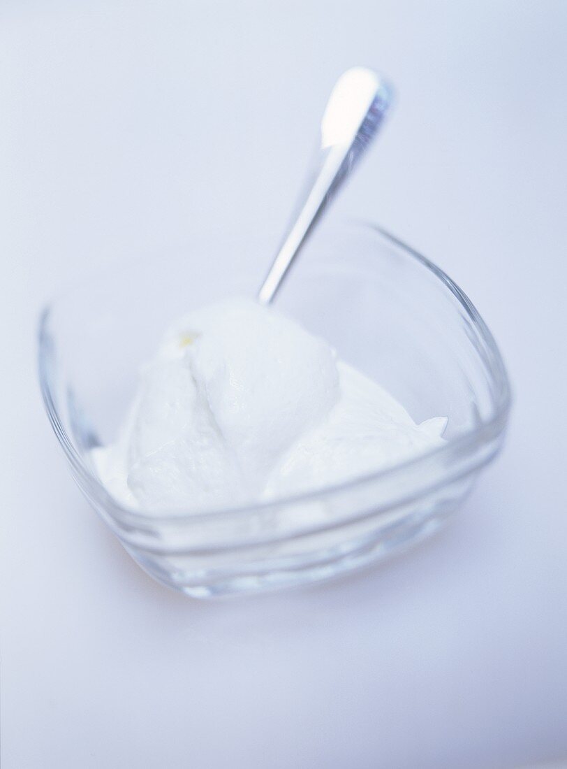 Whipped cream in a glass dish
