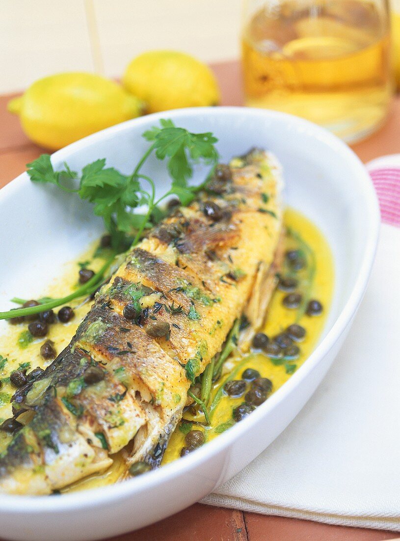Roast sea bass with lemon and capers