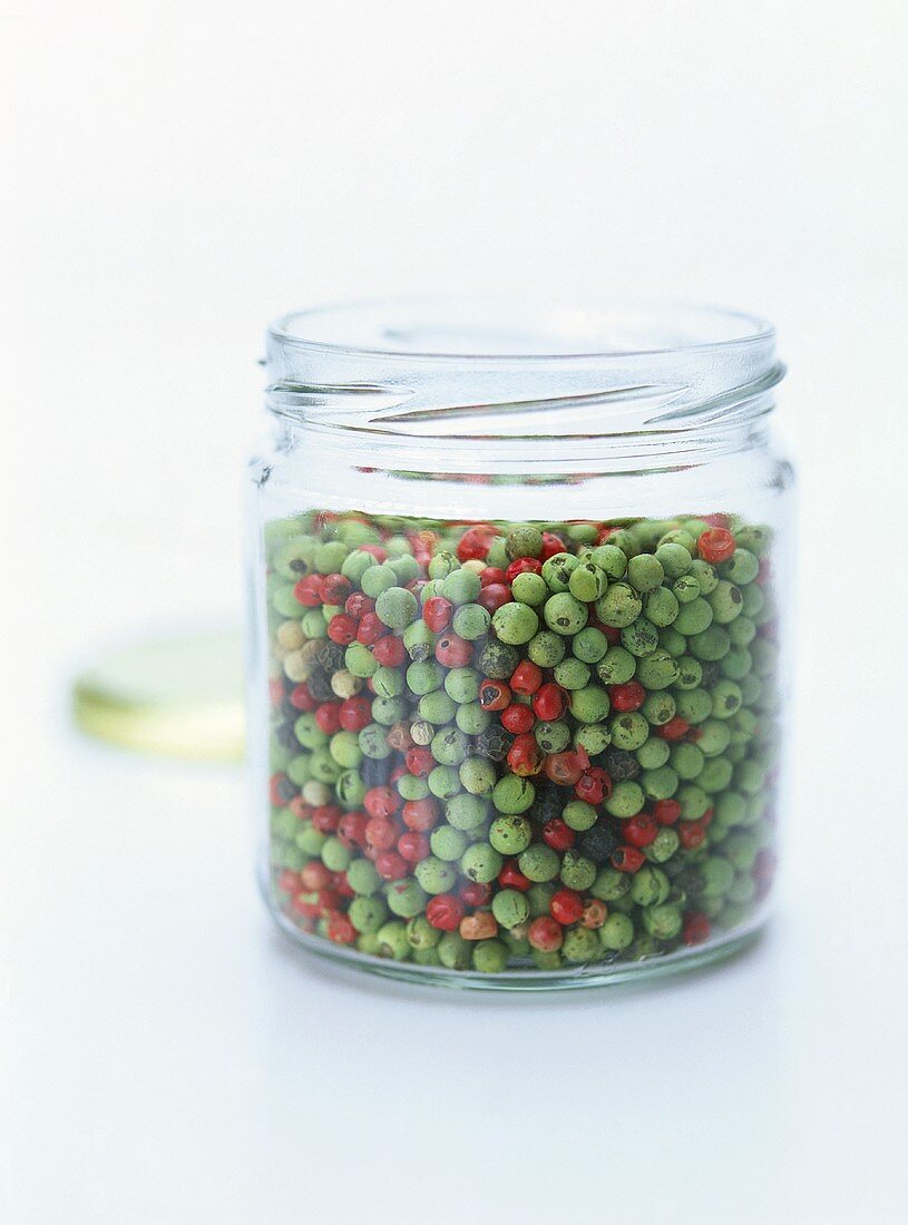 Different coloured pepper in a jar