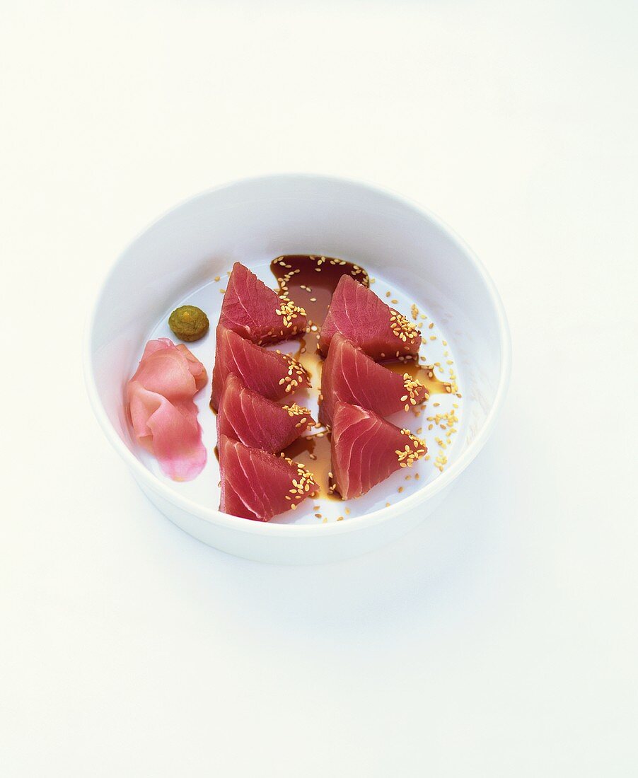 Raw tuna fillet with sesame seeds and soy sauce