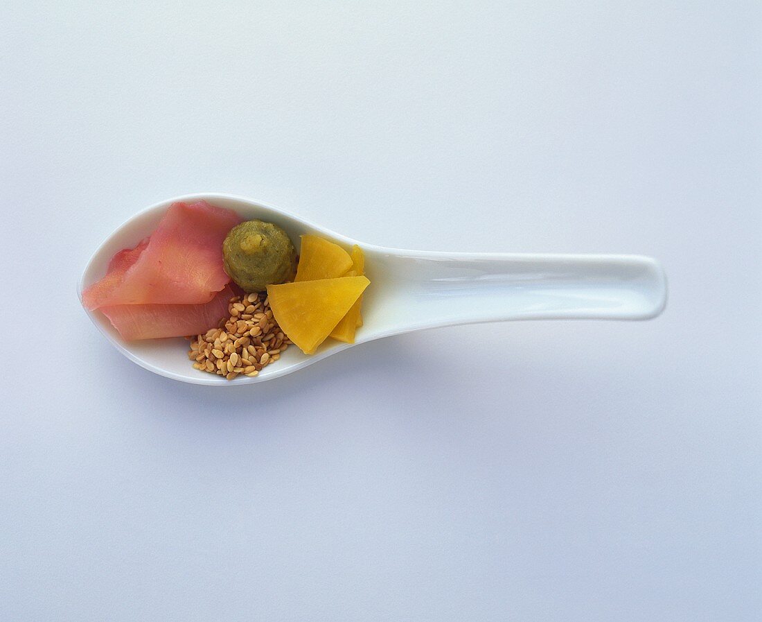 Pickled radish and ginger, wasabi paste and sesame seeds