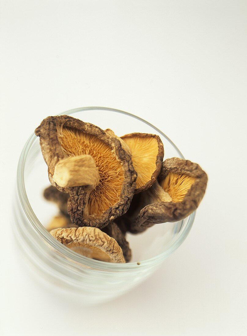 Dried shiitake mushrooms in a glass