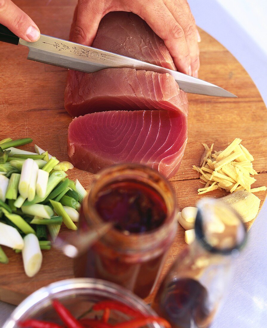 Slicing tuna fillet