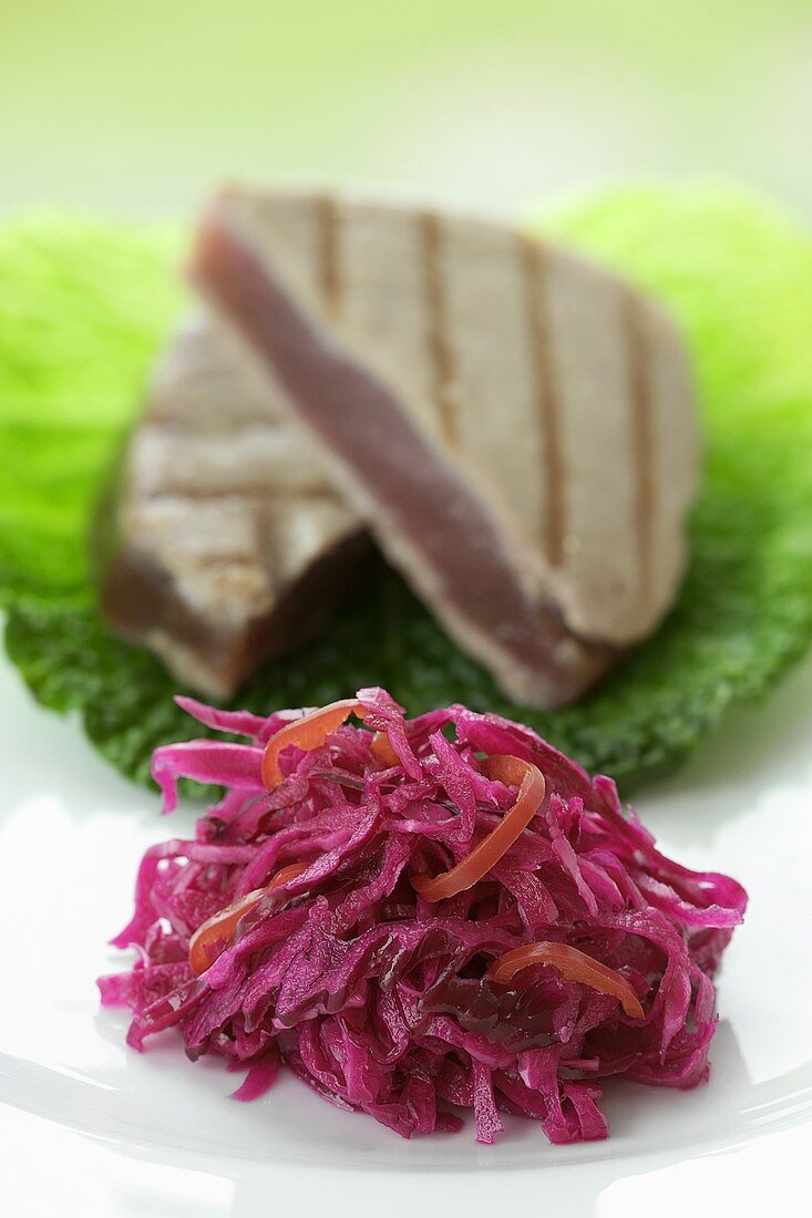 Grilled tuna steak with red cabbage and chilli salad