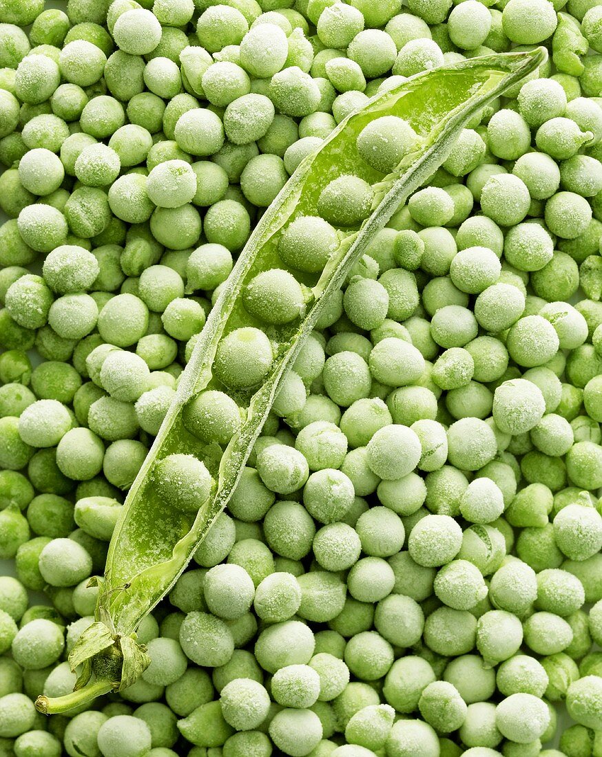 Frozen pea pod on peas