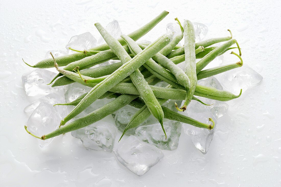 Frozen green beans on ice