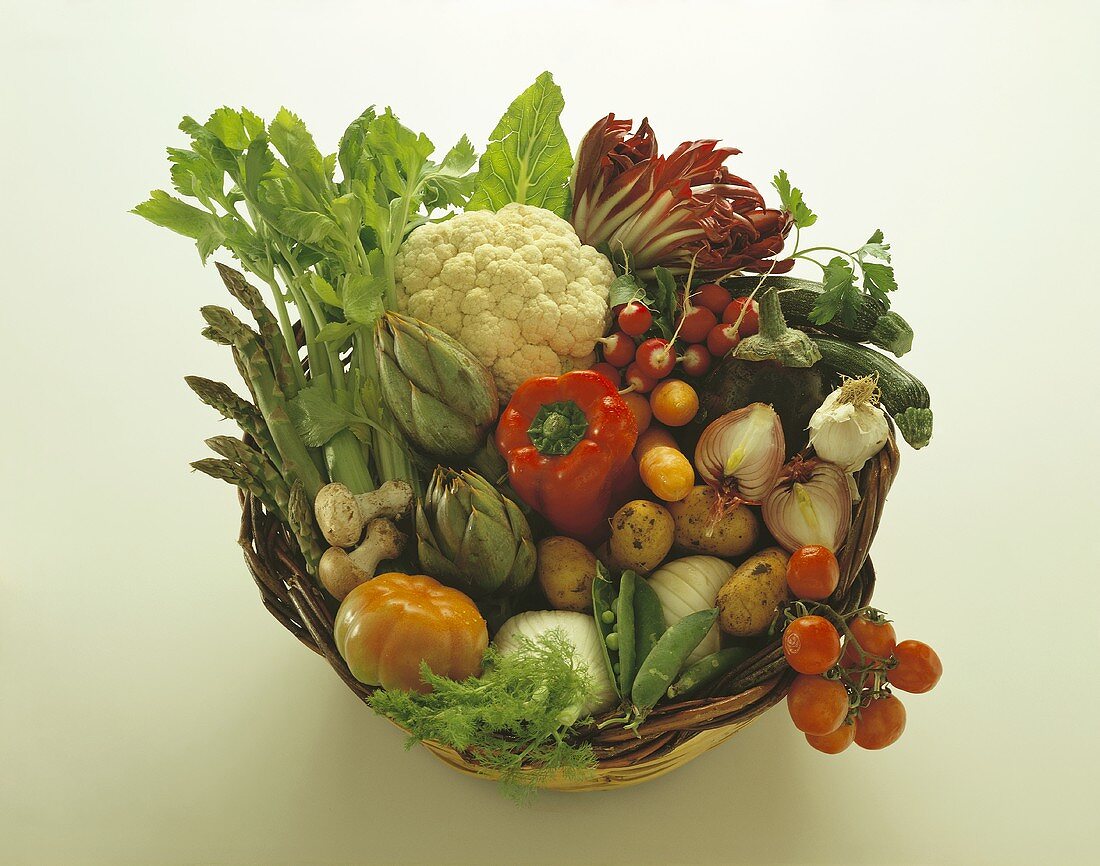 Basket of fresh vegetables and mushrooms