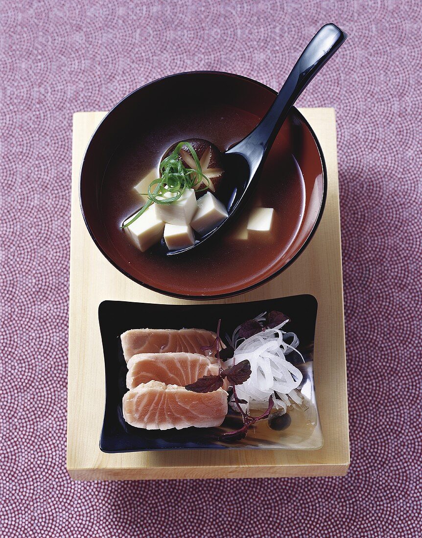 Miso soup with tofu, salmon and radish