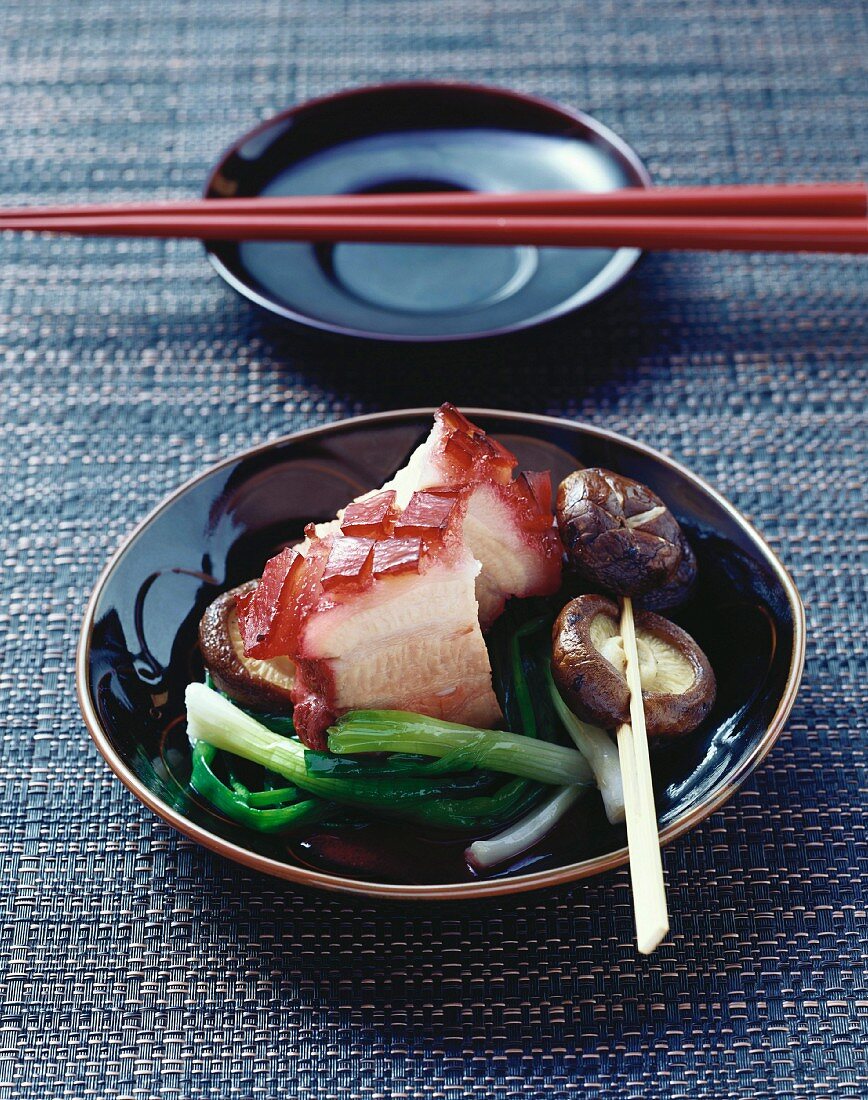 Red braised belly pork with fried shiitake mushrooms