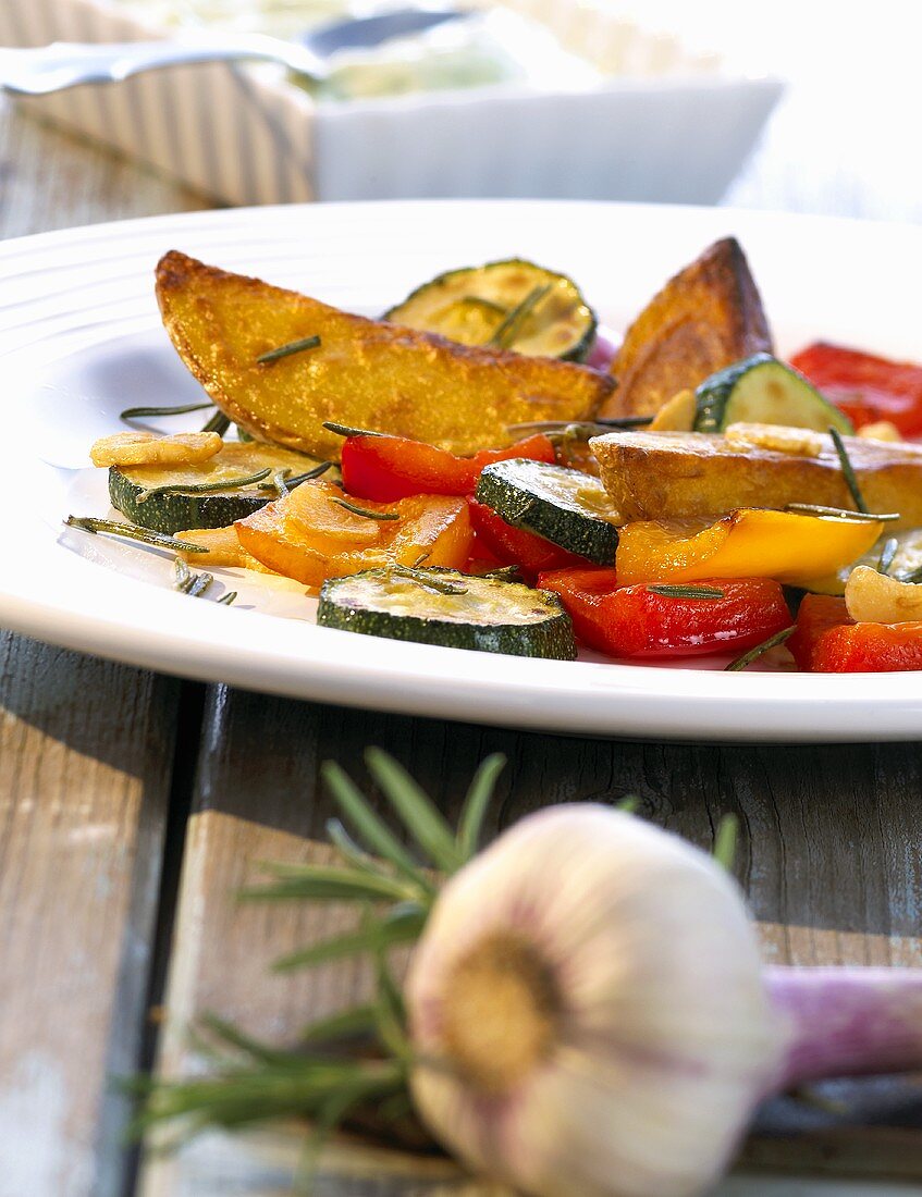 Oven-baked vegetables with avocado sauce
