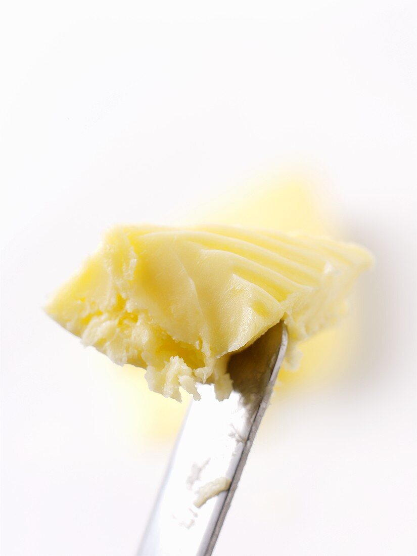 Knob of butter on knife