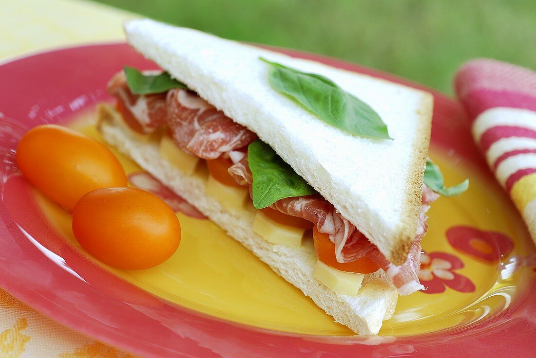 Coppa, tomato and cheese sandwich
